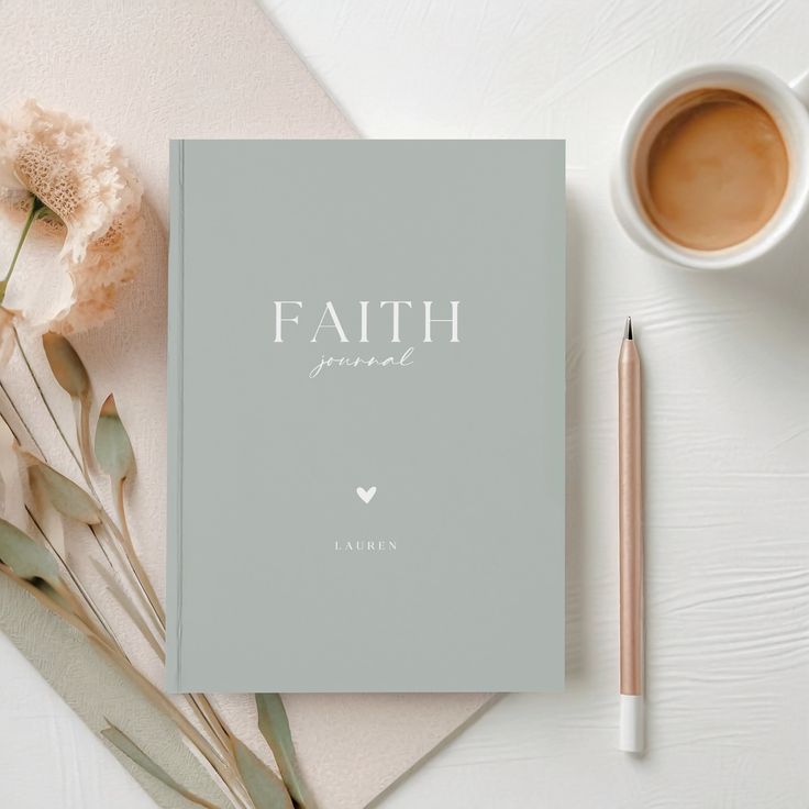 a book with the word faith on it next to a cup of coffee and pencil