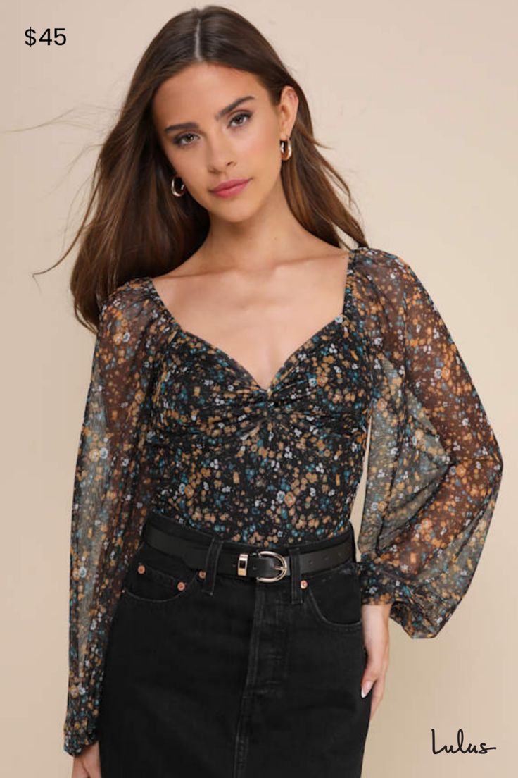 Style the Lulus Sweet Beauty Black Floral Print Knot-Front Bodysuit to create a crush-worthy OOTD! Lightweight mesh, with a ditsy floral print throughout, shapes this cute bodysuit that has a sweetheart neckline and sheer, long sleeves with elastic at the shoulders and cuffs. The fitted bodice features a trendy knotted detail at the front. Attached thong bottoms have snap closures. Fit: This garment fits true to size. Length: Size medium measures 29" from shoulder to hem. Bust: Great for any cup Sheer Floral Top, Floral Bodysuit, Lulu Fashion, Ditsy Floral Print, Mesh Bodysuit, Black Floral Print, Winter Clothes, Ditsy Floral, Black Bodysuit