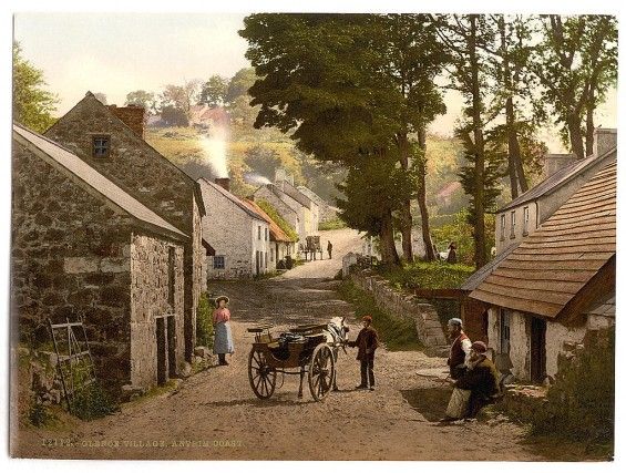 an old photo of people standing on the side of a road with a horse drawn carriage