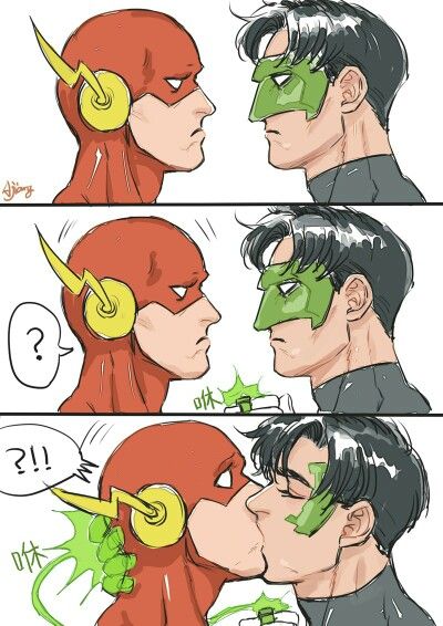 the flash and green lantern face to face, with one being kissing another man's forehead