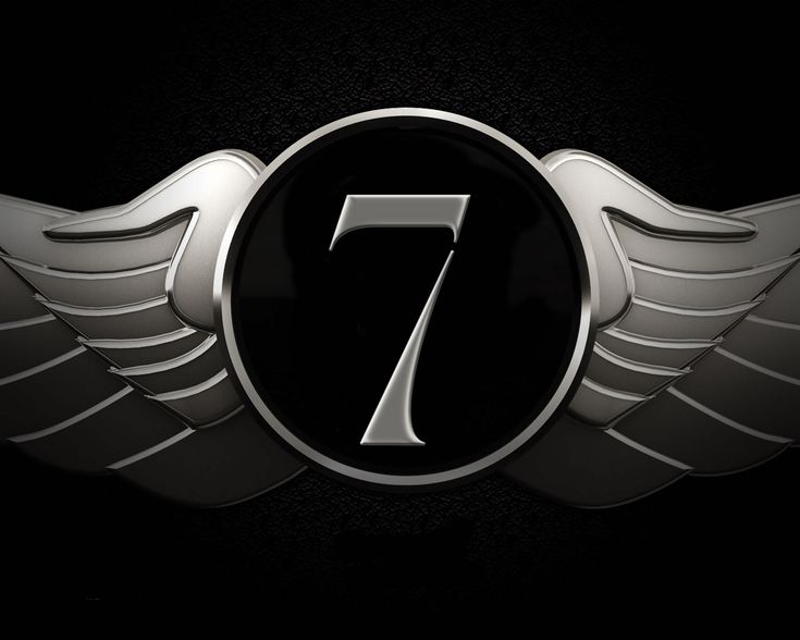 the number seven with wings on it and an emblem for the movie 7 in eclipses