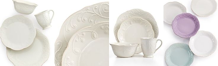 white dishes and cups are arranged in an arrangement on a white background with the same design