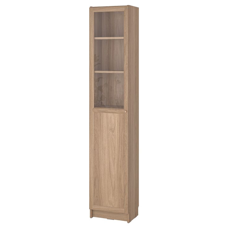 a tall wooden cabinet with glass doors on the front and bottom shelves in light wood