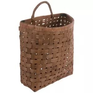 a brown woven basket with handles on a white background