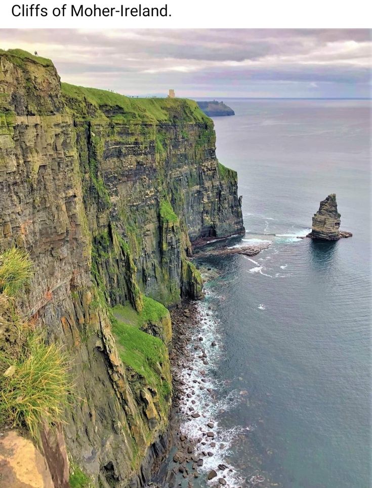 the cliffs of mother - ireland are covered in green grass