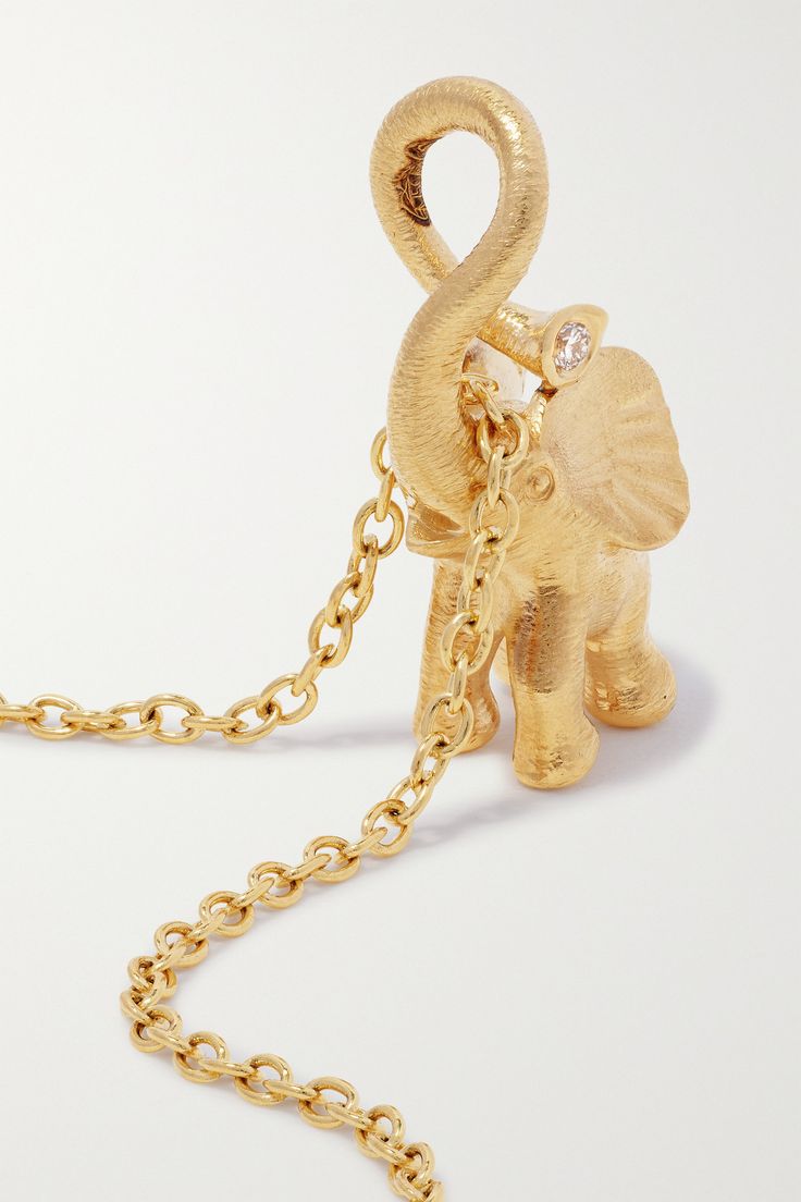 At OLE LYNGGAARD COPENHAGEN's atelier in the Danish capital, a team of goldsmiths and artists work tirelessly to bring sweet creatures, like this 18-karat gold elephant, to life. Strung on a delicate chain, it's studded with a single brilliant-cut diamond. The long drop will suit plunging and sweetheart necklines. Gold Elephant Pendant, Gold Elephant, Elephant Pendant, Vs Diamond, Gold Diamond Necklace, Tourmaline Necklace, Delicate Chain, Artist At Work, Net A Porter