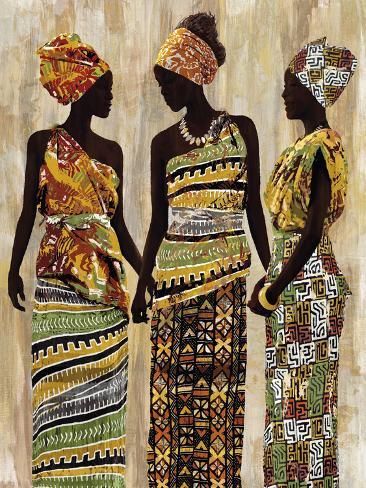 three women in african print dresses standing next to each other