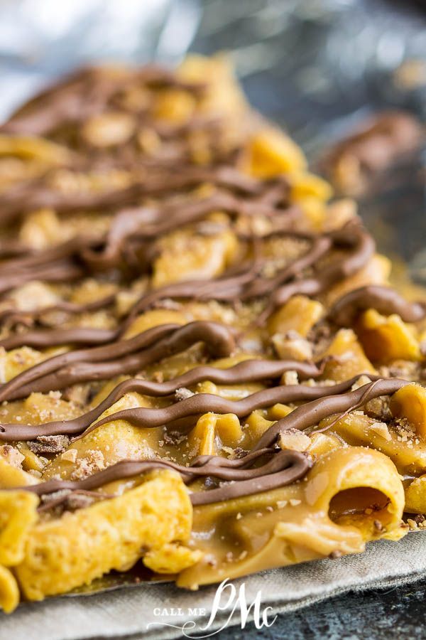 a close up of a pastry with chocolate drizzled on it