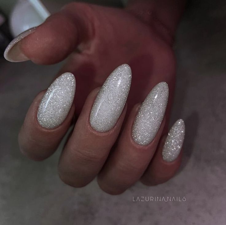 White Glittery Almond Nails, White Sparkly Acrylic Nails, Nye Nails Almond Shape, White Sparkly Nails, White Sparkle Nails, Sparkly Nail Designs, Sparkly Acrylic Nails, White Almond Nails, Nye Nails