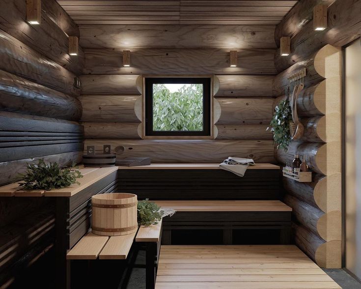 a bathroom with wooden walls and flooring next to a window in the middle of it