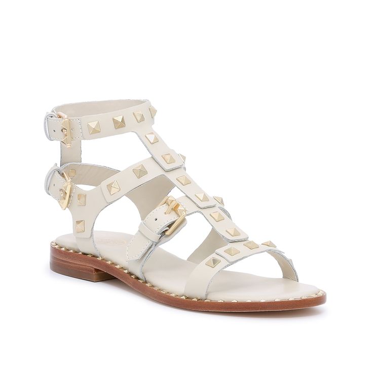 ASH-Pacific Gladiator Sandal Elevate summery looks with the Pacific gladiator sandal from Ash. This leather pair sports metallic stud detailing that sharpens up your wardrobe with ease. Spring Rivets Open Toe Sandals, Spring Open Toe Sandals With Rivets, Casual Summer Sandals With Rivets, Summer Sandals With Rivets And Round Toe, Spring Ankle Strap Sandals With Spikes, Casual Rivets Sandals For Spring, Spring Beach Sandals With Rivets, Summer Leather Sandals With Rivets, Leather Sandals With Gold Studs For Summer