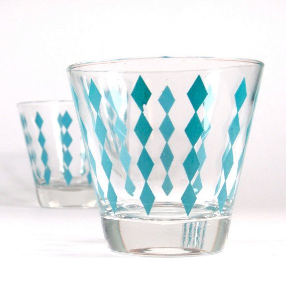 three glasses with blue and white designs on them