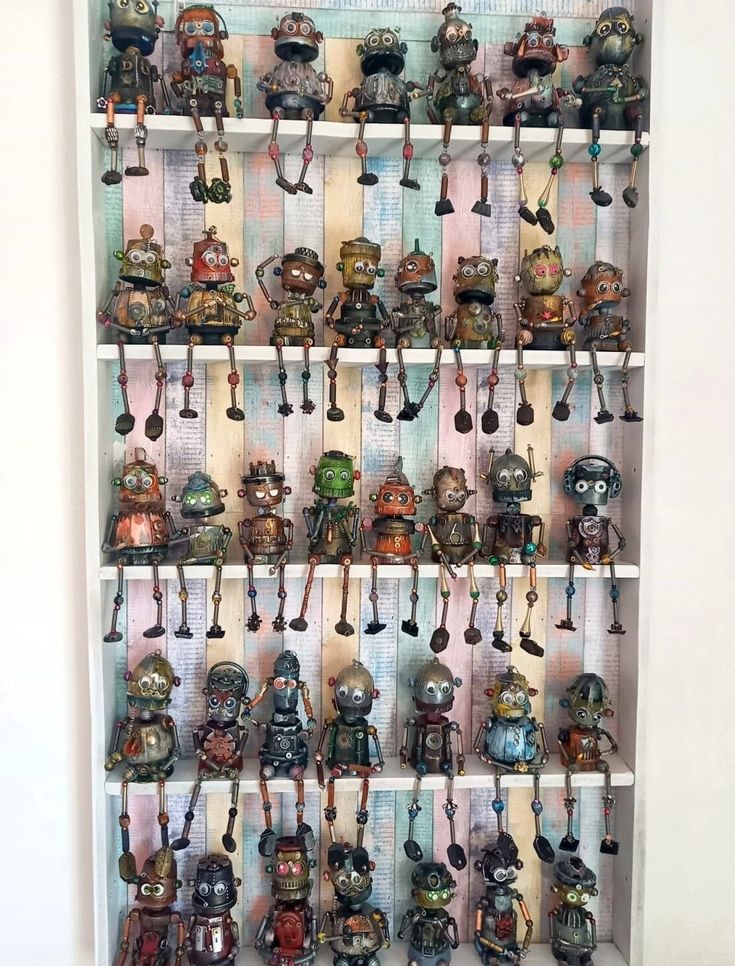 a shelf filled with lots of different types of figurines on it's sides