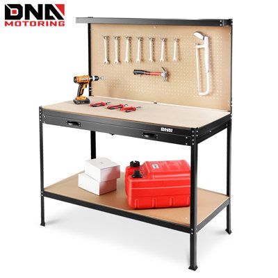 a workbench with tools in it and an open toolbox on the side