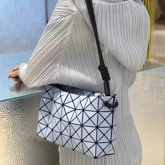 NWT Bao bao  Issey Miyake Shoulder Bag White Bao Bao Bag, Issey Miyake Bag, Bao Bao Issey Miyake, Pink Shoulder Bag, White Shoulder Bag, Bao Bao, Yellow Handbag, Sack Bag, Bag Light