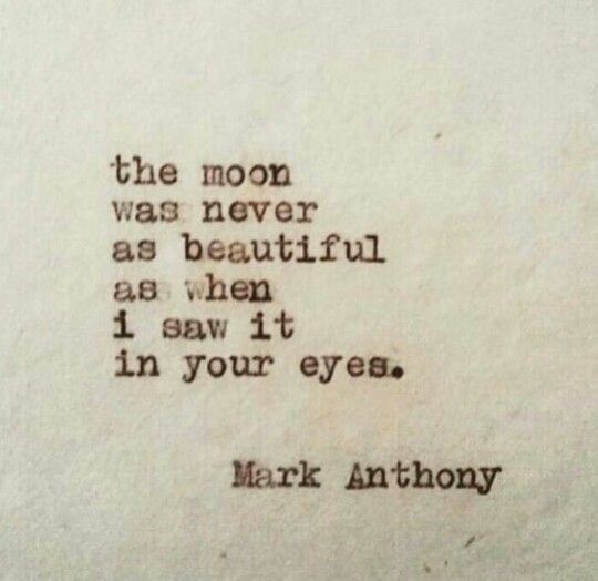 an old typewriter with the words, i saw it in your eyes and the moon was never as beautiful as when i saw it in your eyes