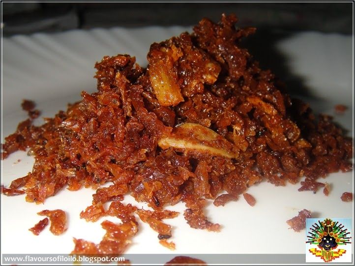 a pile of food sitting on top of a white plate