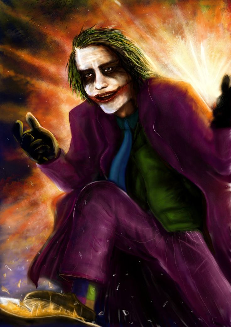 the joker is sitting down with his hands in the air