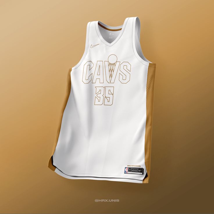 a white basketball jersey with the word caws on it hanging from a hook in front of a tan background