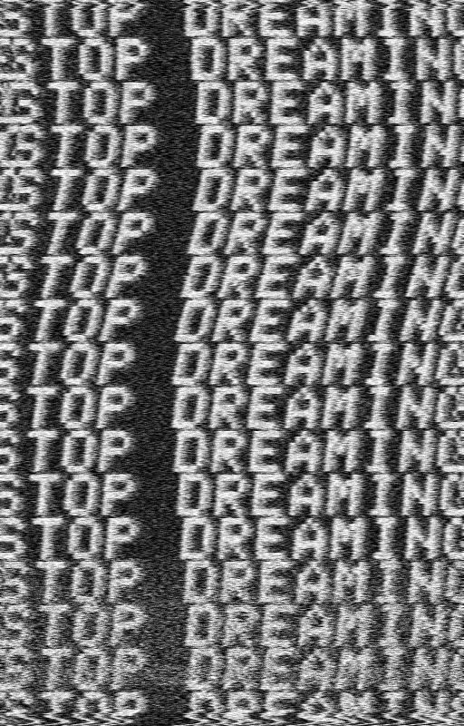 the words dream written in white and black on an old television screen with some type of writing