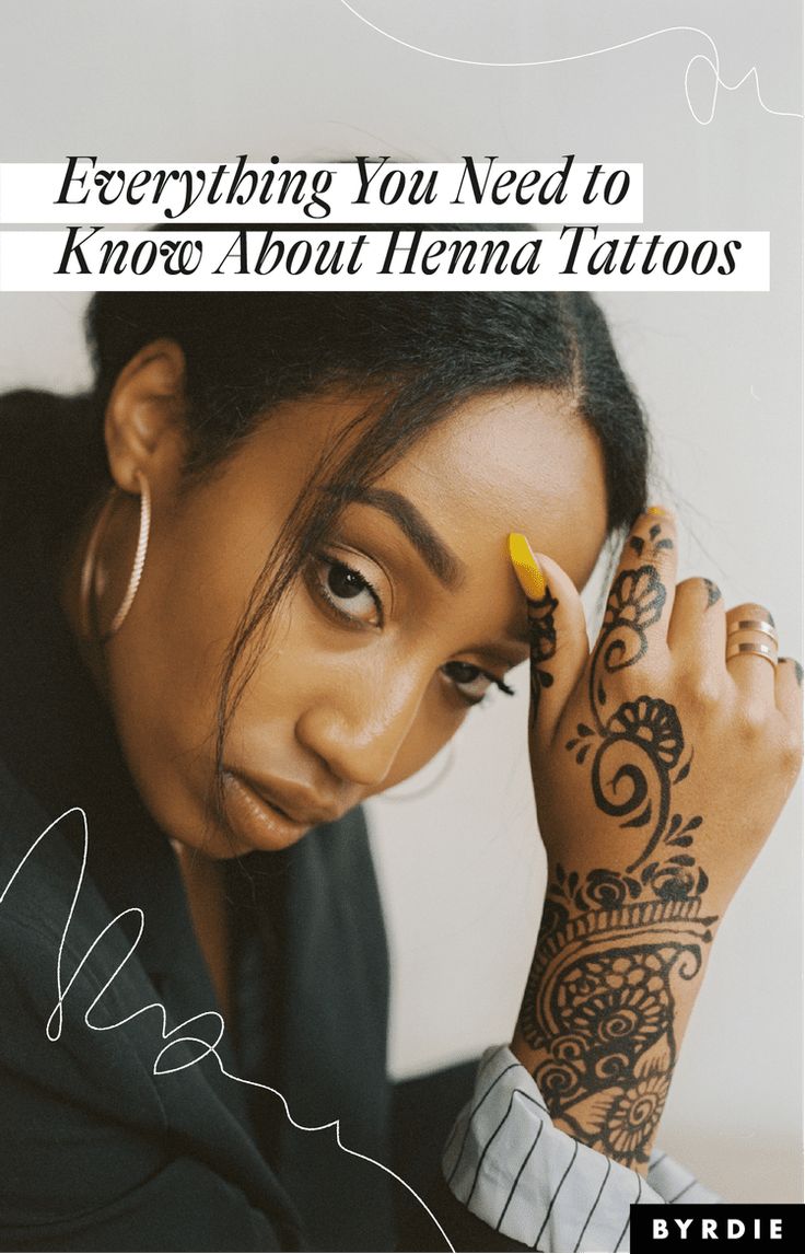 a woman with tattoos on her arm holding a cell phone to her ear and the words everything you need to know about henna tattoos