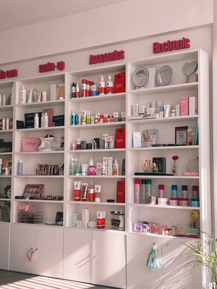 the shelves are filled with many different types of cosmetics and personal care products on them