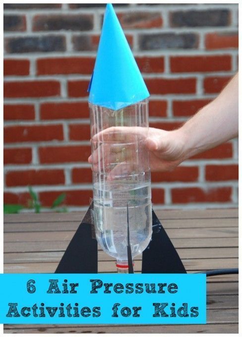 a person holding a water bottle with the words 6 amazing air pressure activities