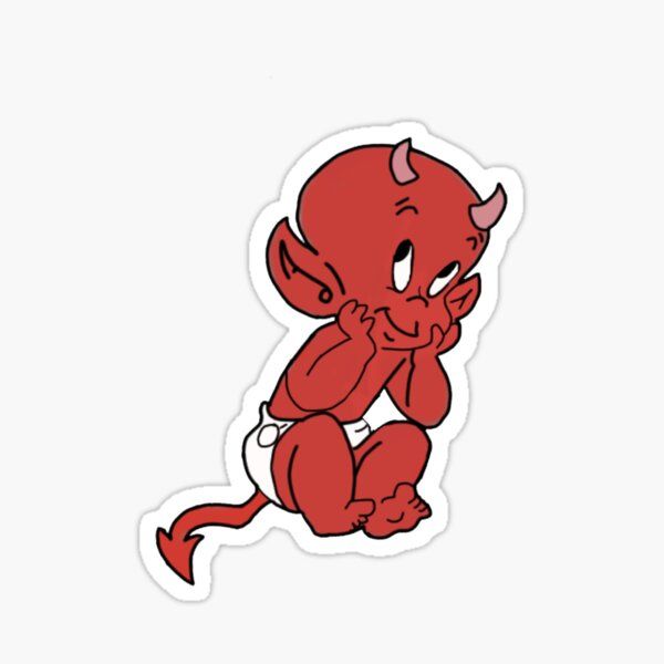 a red devil sticker sitting on top of a white surface