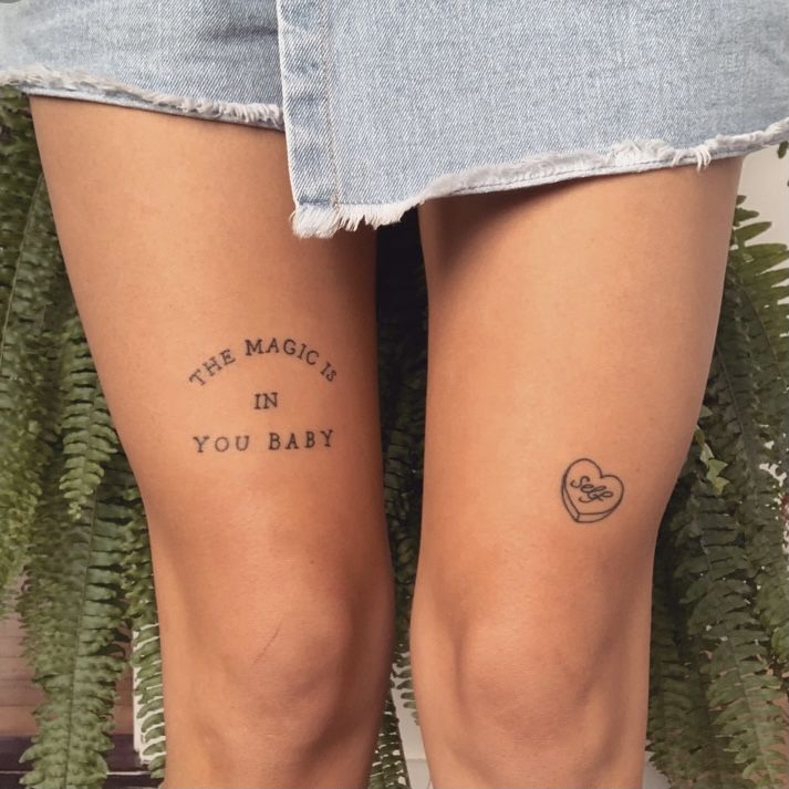 the legs of a woman with tattoos on them and words that read, there magic is in you baby