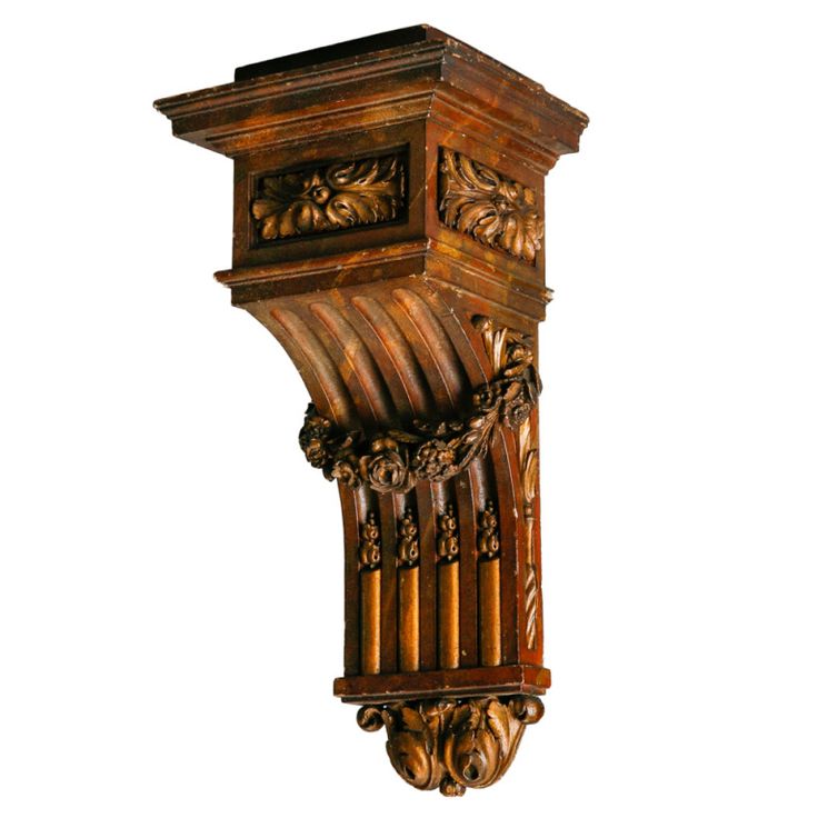 an ornate wooden shelf with carvings on it