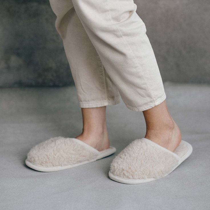 "High quality merino sheep wool slippers with non-slip sole, Slip on style, Cushion Comfort, Breathable, Handmade, for Women and Men, Beige, Indoor use. Crafted from pure 100% merino wool and finished in a nice natural colour, these hand made wool slippers are a true indulgence at an affordable price. The open-ended design is perfect for easy-on, easy-off use around the home. Wool is the perfect material for a slipper. This wonderful fibre regulates temperature and humidity to ensure you do not Cozy Beige Slip-on Slippers, Cozy Slip-on Slippers With Soft Texture, Cozy Round Toe Slippers For Relaxation, Cozy Soft Texture Slip-on Slippers, Cozy Indoor Slippers With Rubber Sole, Comfortable Slippers With Soft Texture And Round Toe, Cozy Super Soft Slippers For Home, Comfy Cream Indoor Slippers, Comfortable Super Soft Beige Slippers