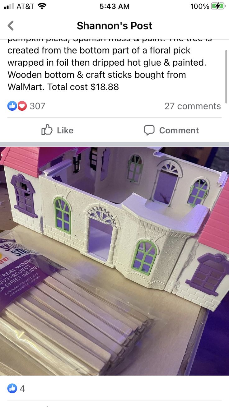 an image of a doll house made out of cardboard