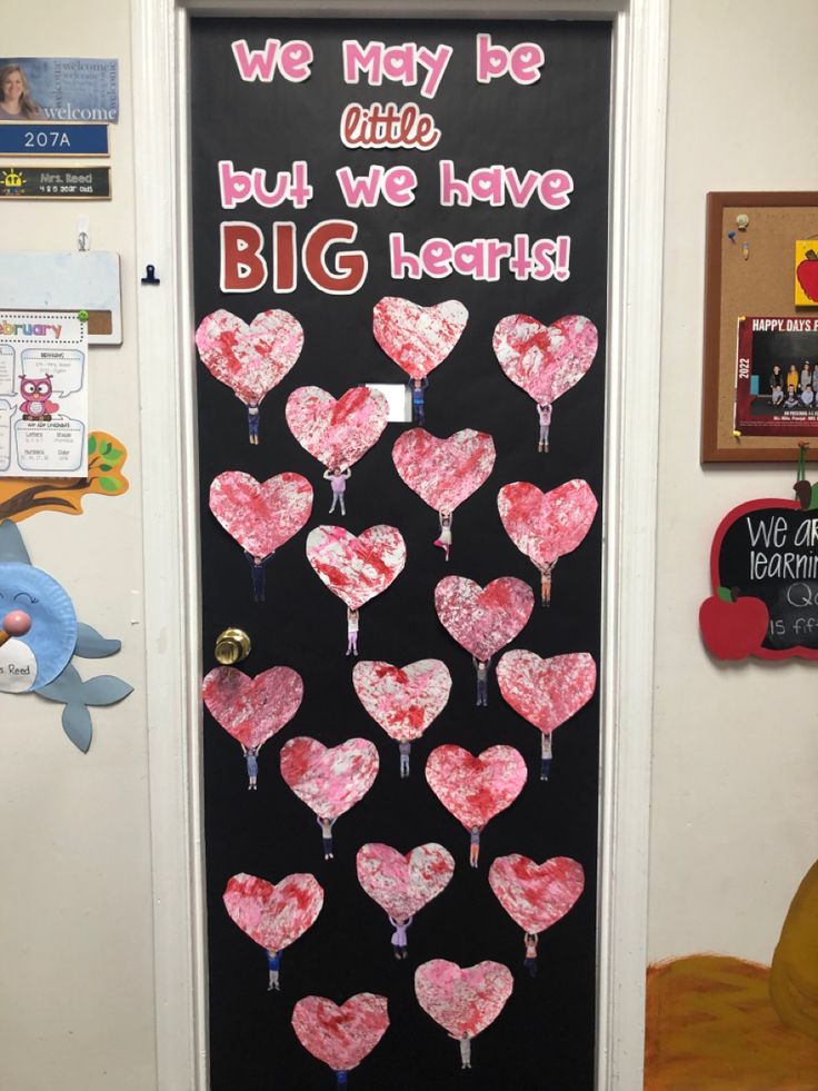 a bulletin board with hearts on it that says we may be little but we have big hearts