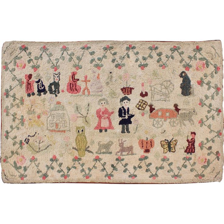 an old rug with various embroidered animals and people on it's sides, including cats