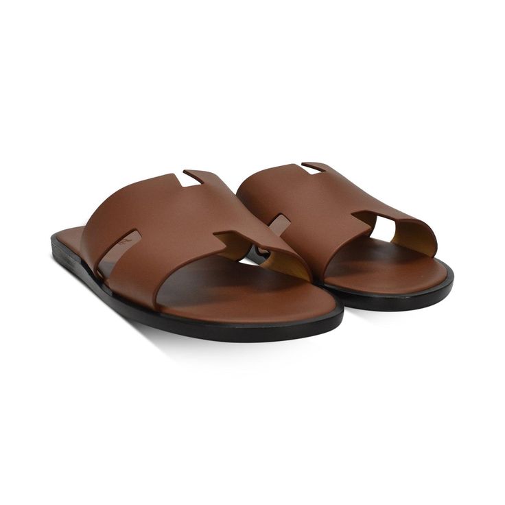 Hermes 'Oran' Sandals in brown leather with a black sole. Includes dust bag and box. Brand = Hermes Condition = 9/10, like new Size= 42.5 Material = Leather SKU = 17595-1 Hermes Slides, Hermes Sandals, Hermes Oran Sandals, Tan Sandals, Mens Slides, Hermes Oran, Hermes Men, Brown Sandals, Mens Sandals