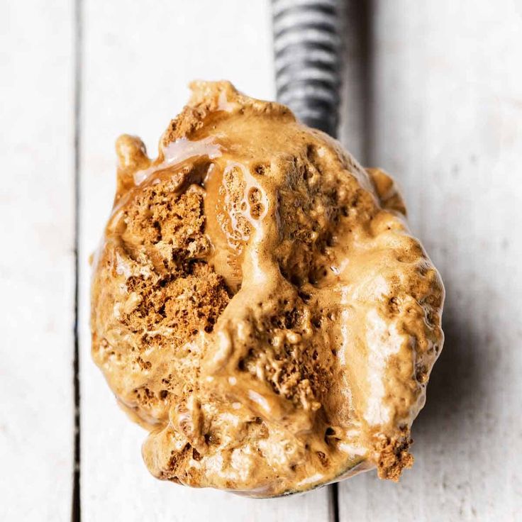 a cookie doughnut covered in peanut butter