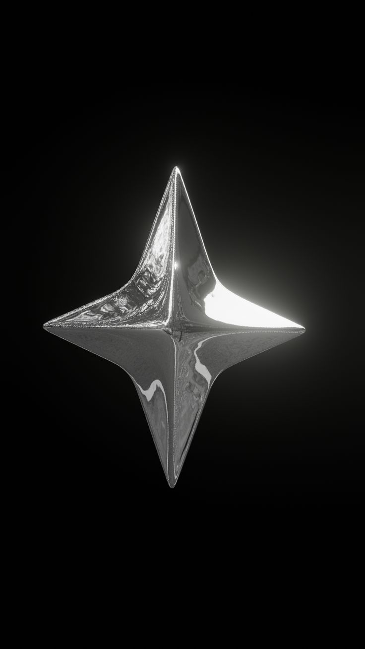 a silver object is shown against a black background