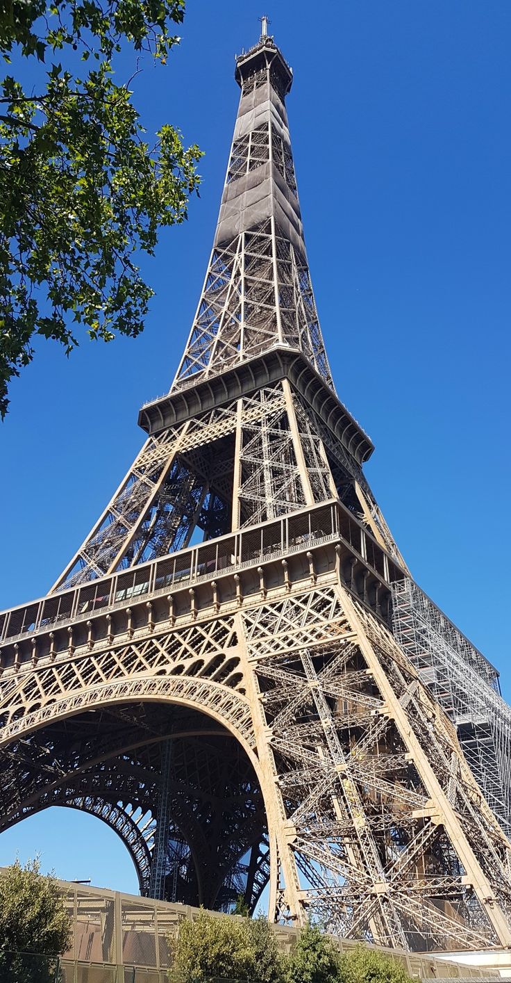 the eiffel tower is very tall and has many steps to climb up it