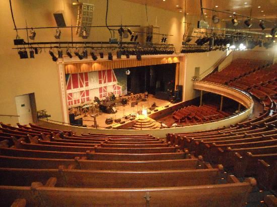 an empty auditorium filled with lots of seats