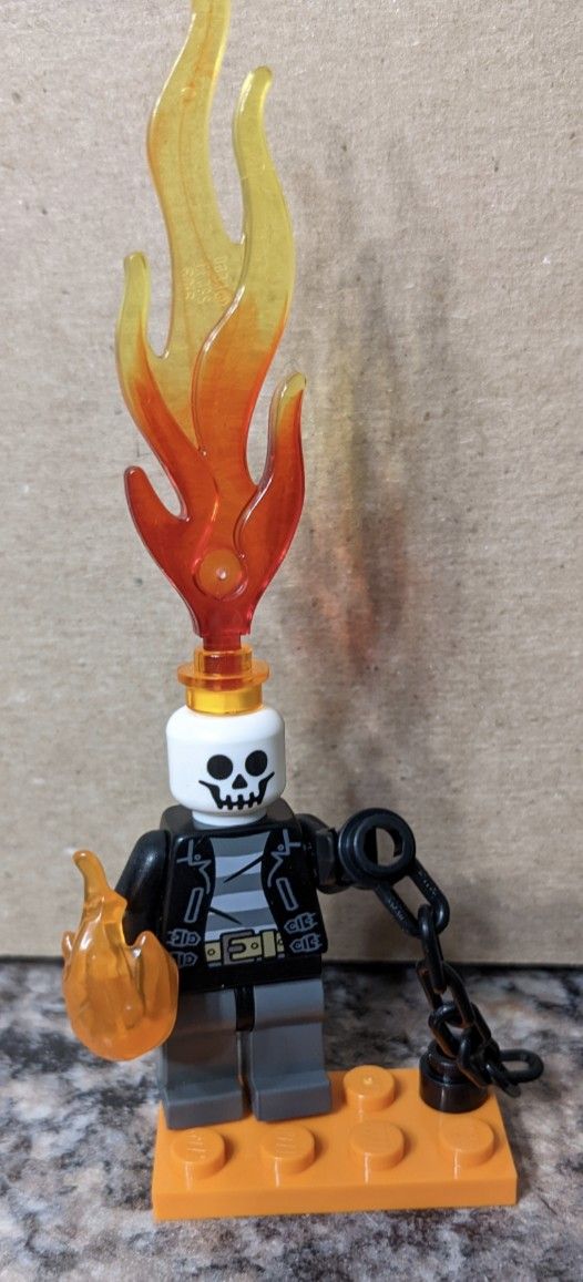 a lego figurine is shown with flames coming out of it's head