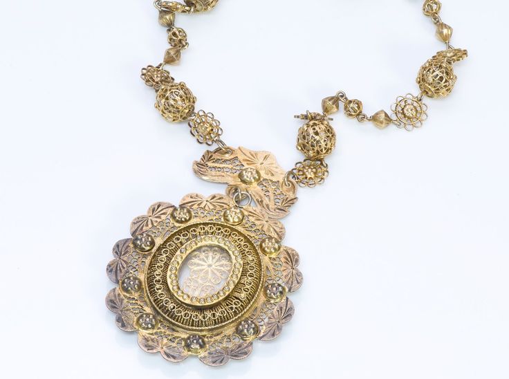 Antique Necklace Pendant. Victorian Spanish silver gilt filigree necklace pendant. Elegant Antique Gold Pendant Necklace, Hallmarked Pendant Necklace, Elegant Long Engraved Necklace, Antique Hallmarked Flower Pendant Necklace, Victorian Jewelry With Large Medallion Pendant, Antique Necklaces With Detachable Round Pendant, Antique Necklace With Detachable Round Pendant, Antique Yellow Gold Jewelry With Detachable Pendant, Traditional Oval Pendant Jewelry For Formal Occasions