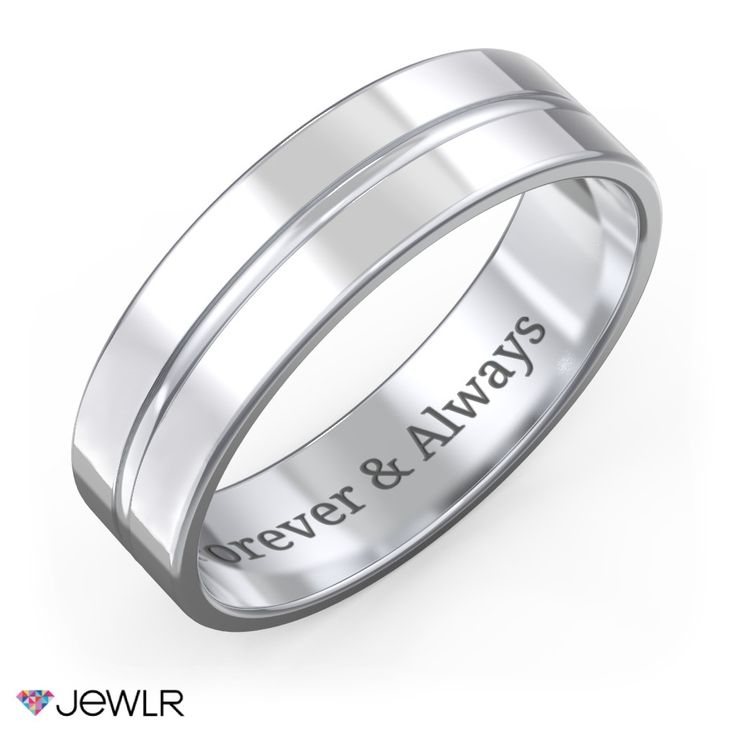 a wedding ring with the words free engraving engraved on it, in white gold and silver