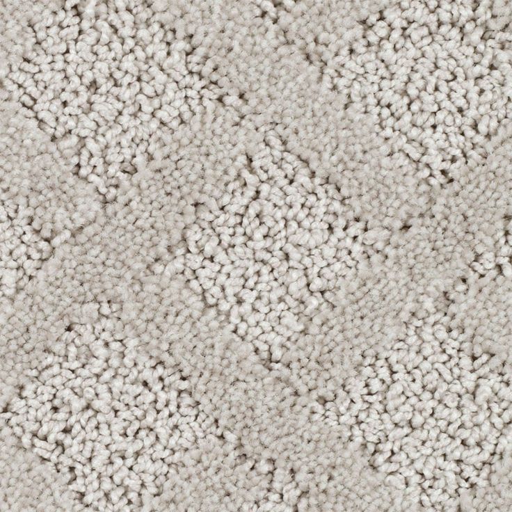 an up close shot of the texture of a carpet with white and gray color scheme