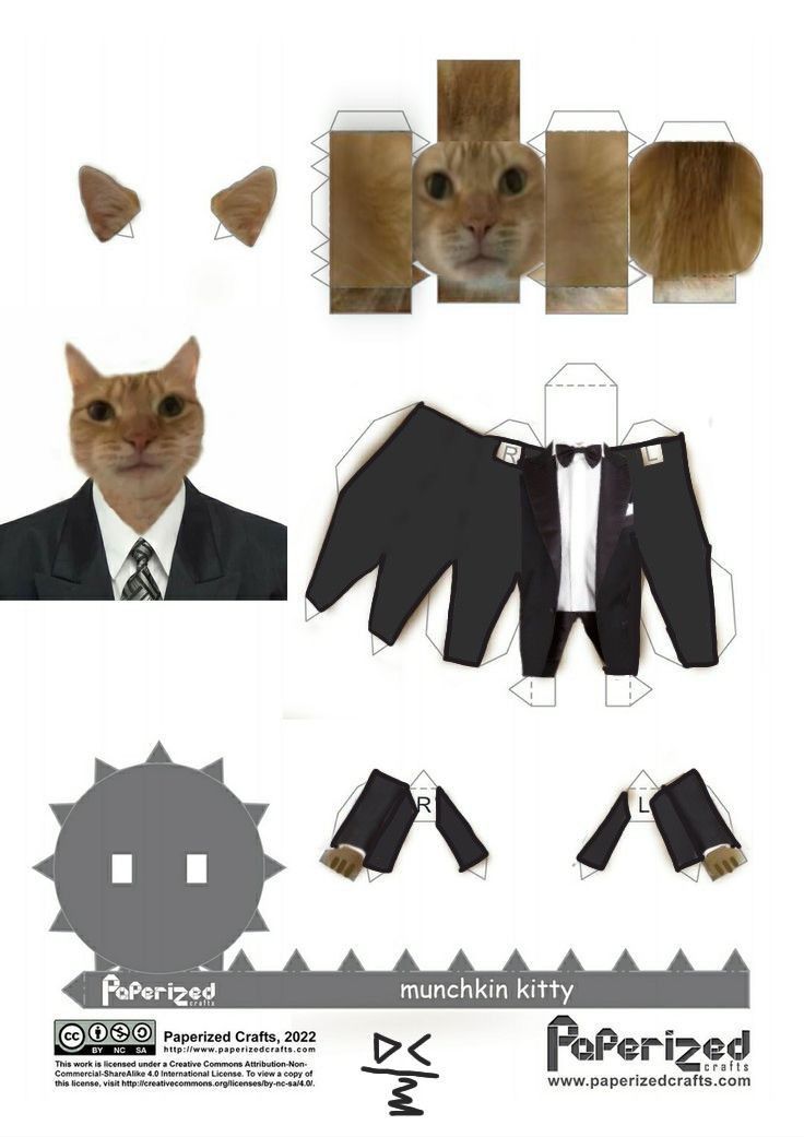 a paper model of a cat wearing a suit and tie