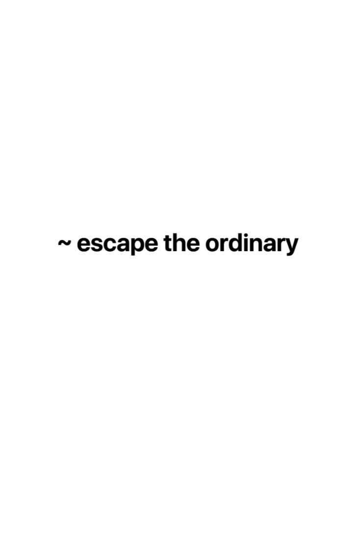 the words escape the ordinary are black and white