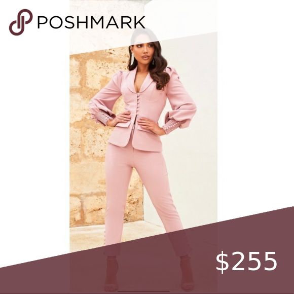 LAVISH ALICE SHIRRING BALLOON SLEEVE PANT SUIT Meet the power suit you need in your late summer wardrobe. With statement balloon sleeve and shirring detail, the puff sleeve tailored jacket will be your go-to time after time. Pair it with some sparkle for evening glam. Cute as a button… these button detail trousers in feminine mauve are the perfect way to accentuate those pins. With a high waist finish, you can be sure that the fit is flattering, whilst the button detailing offers a quirky twist. Fitted Suits With Trousers For Parties, Pink Fitted Trousers Pantsuit, Pink Fitted Pantsuit, Pink Fitted Trouser Set, Fitted Pink Trousers Set, Pink Fitted Trousers Set, Lavish Alice, Time After Time, Cute As A Button