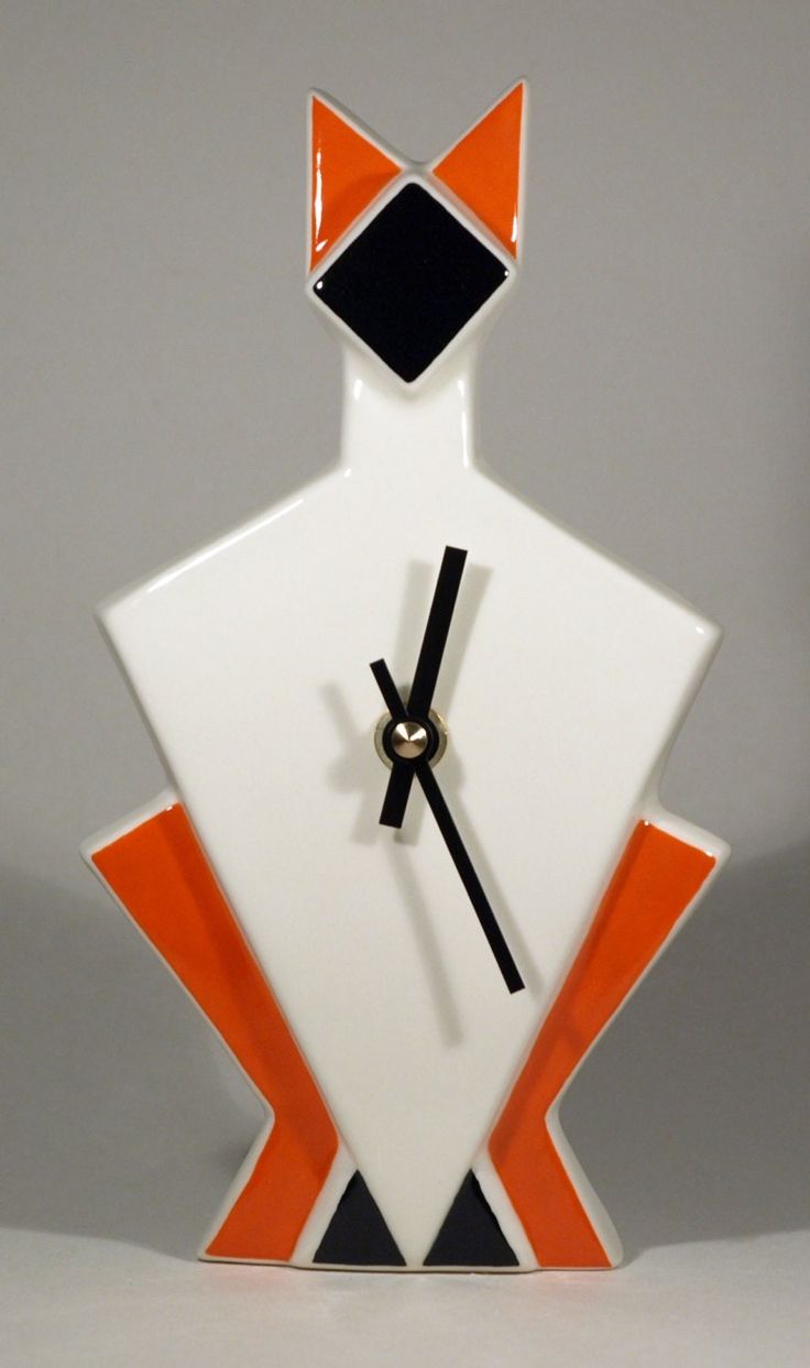 an orange and white clock with black hands on a gray background, in the shape of a man