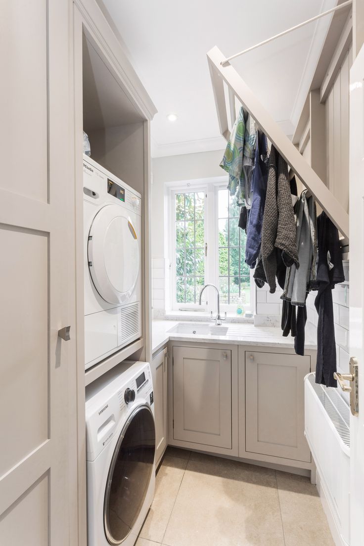 a washer and dryer in a small room