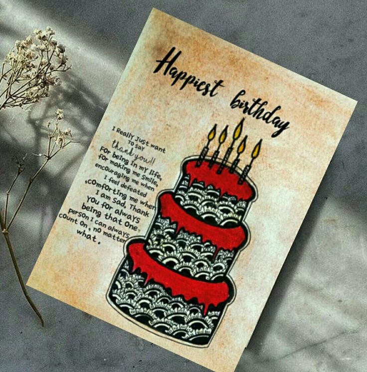 a greeting card with a birthday cake on it