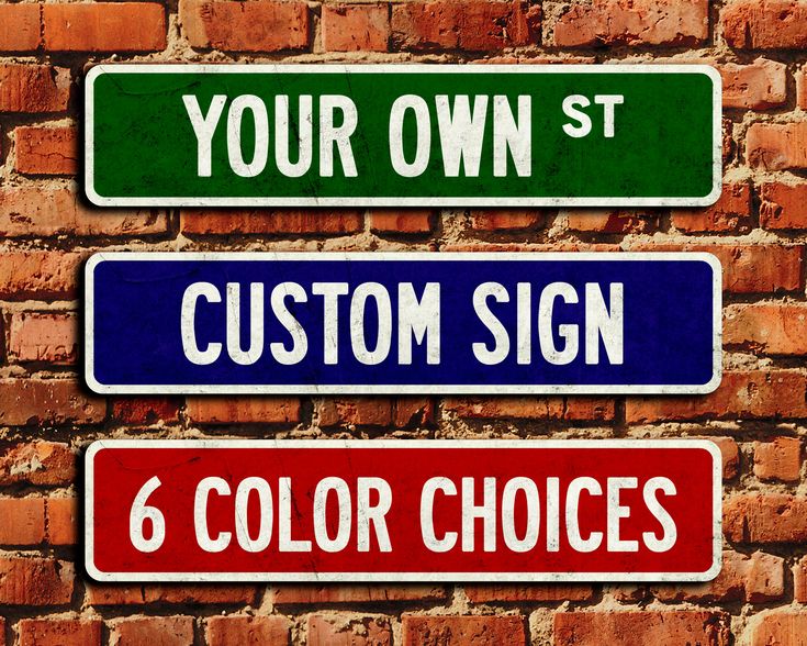 four street signs on a brick wall that say your own, custom sign, 6 color choices